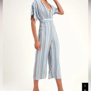 Lulu’s Vacation Bae Light Blue Striped Short Sleeve Jumpsuit
Size L NEW